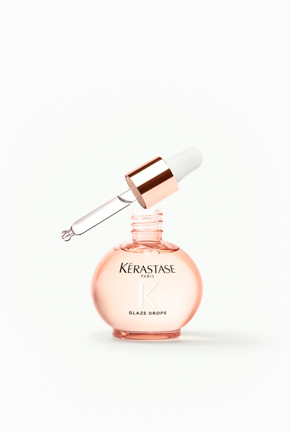 Kerastase Glaze Drops glass bottle with applicator zoomed in