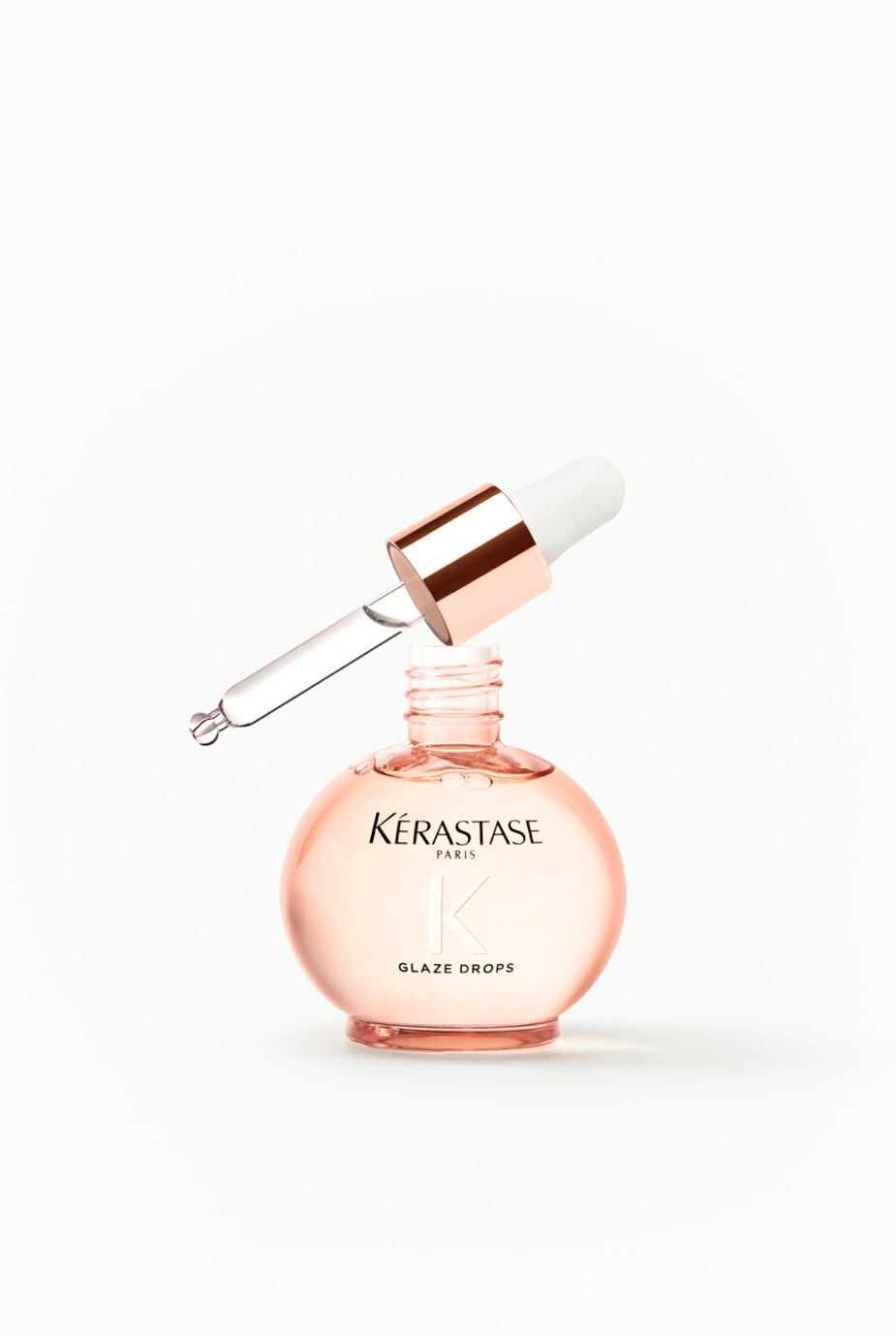 Kerastase Glaze Drops glass bottle with applicator zoomed in