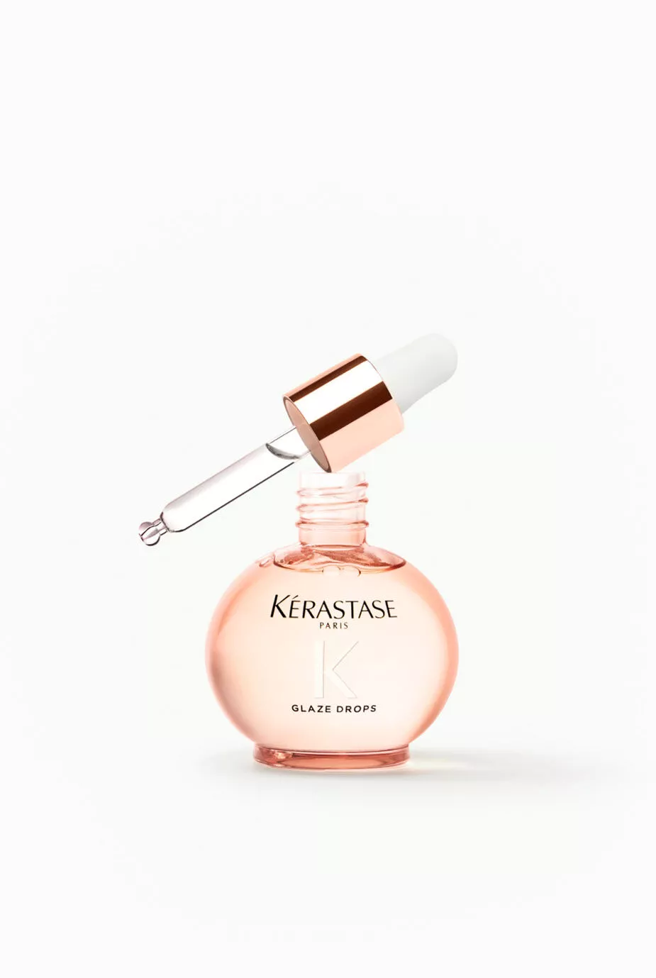 Kerastase Glaze Drops glass bottle with applicator zoomed in