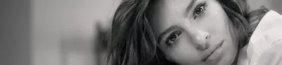 Banner with Emily Ratajkowski's face zoomed in with black and white effect