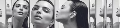 Monochrome portrait of woman with sleek hair reflected in mirrors
