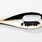Gold spoon with black pearls and cream from Kerastase Chronologiste