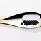 Gold spoon with black pearls and cream from Kerastase Chronologiste