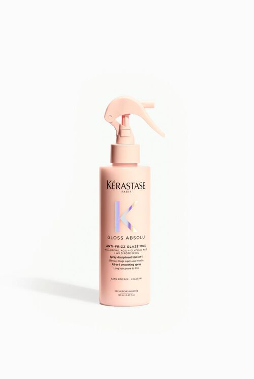 Kerastase Gloss Absolu Anti-Frizz Glaze Milk bottle on white background