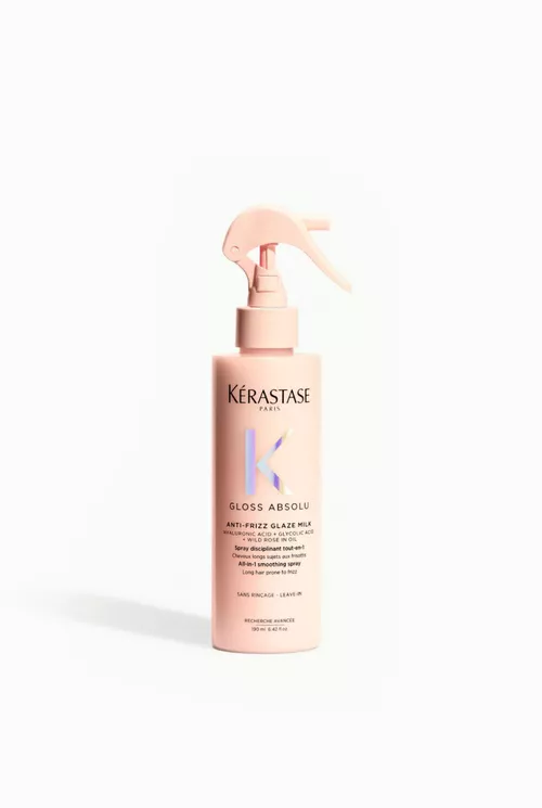 Kerastase Gloss Absolu Anti-Frizz Glaze Milk bottle on white background