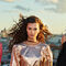 Kerastase Chroma Absolu hair care collection on pink marble background