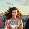 Kerastase Chroma Absolu hair care collection on pink marble background