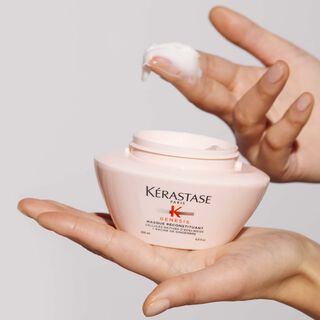 Kerastase Masque Reconstituant Genesis Treatment to fortify hair product in hand