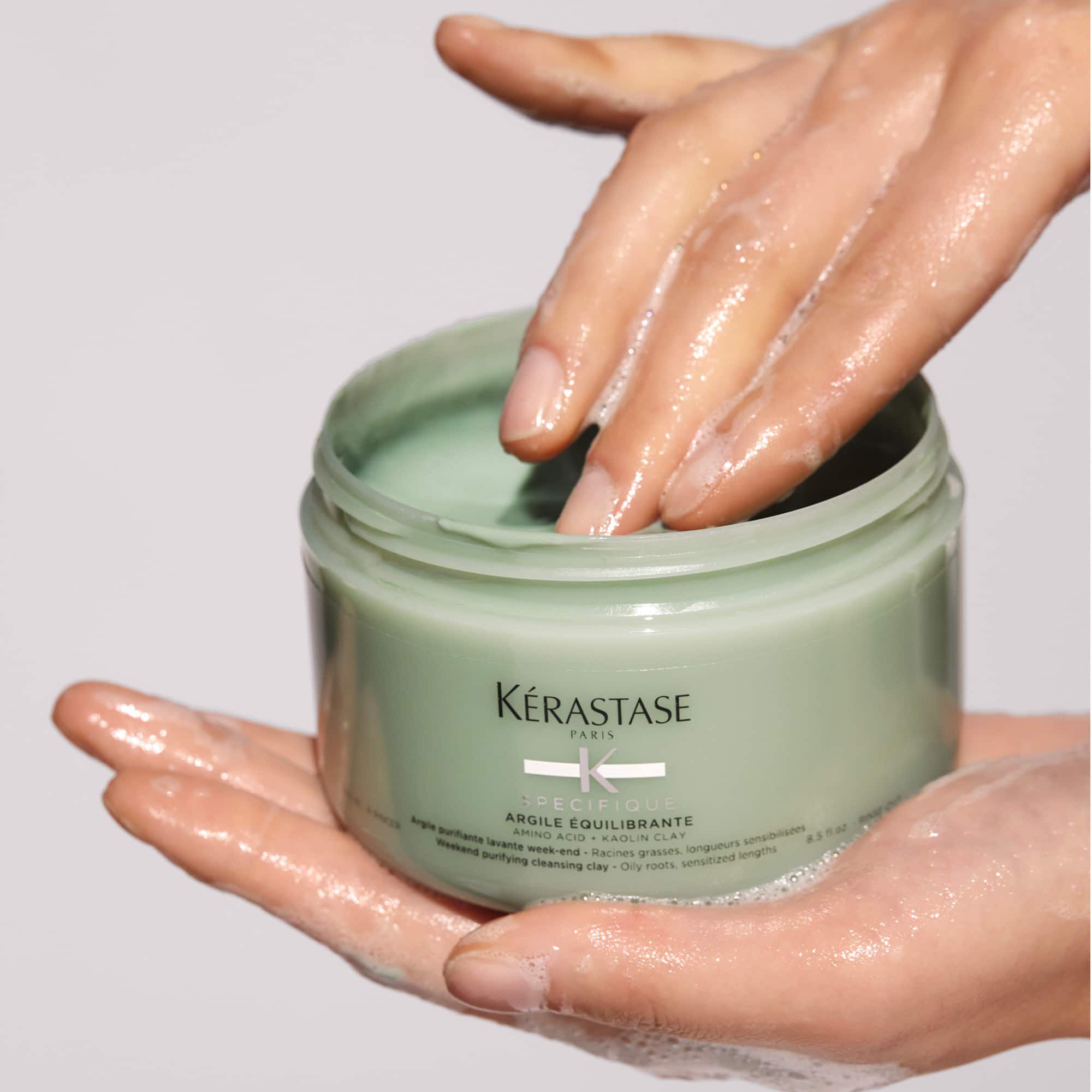 Kerastase Argile Divalent Specifique Treatment for balanced scalp product in hand