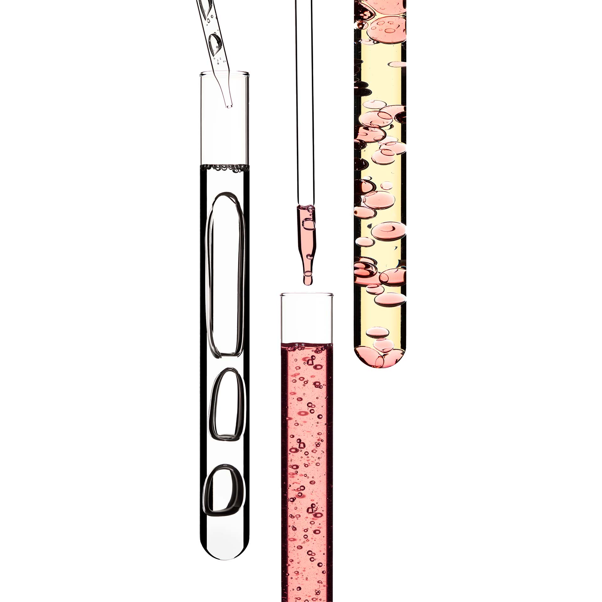 3 vials with liquid, including one clear and two pink formulas